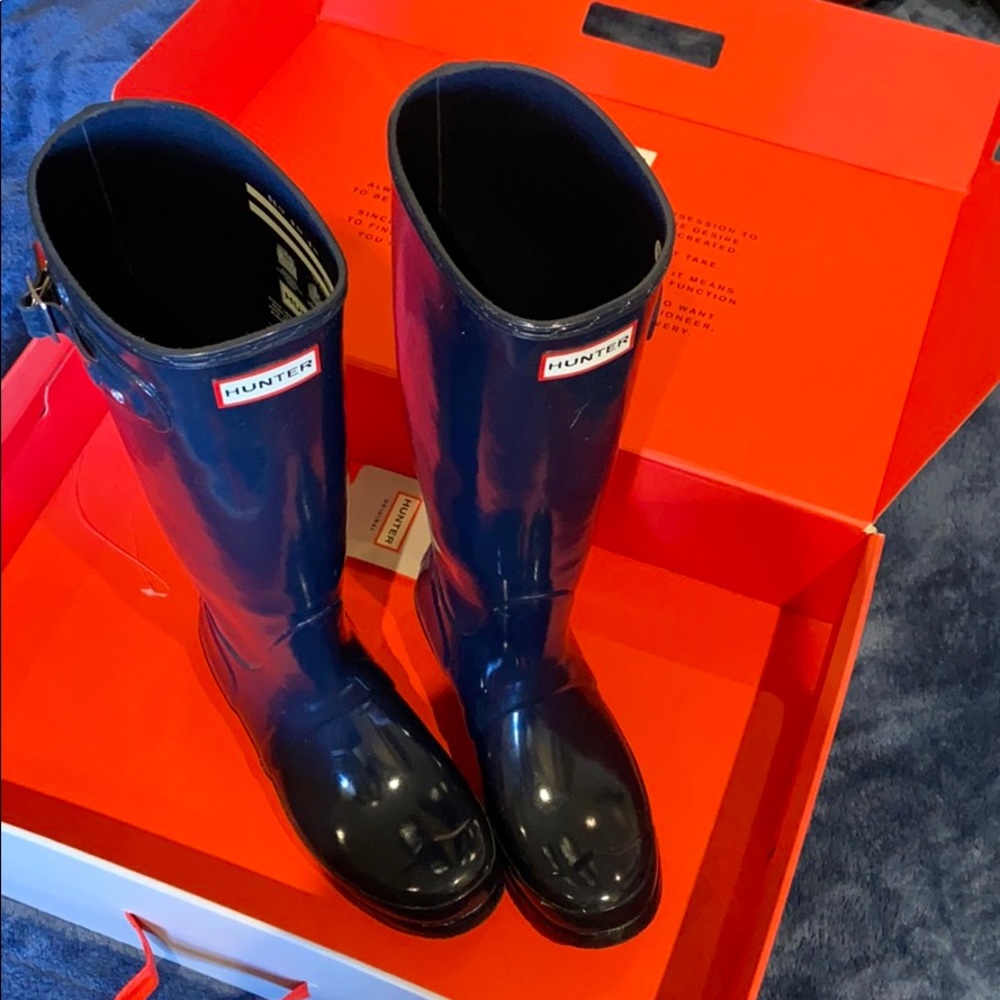 Knee high hunter rain boots